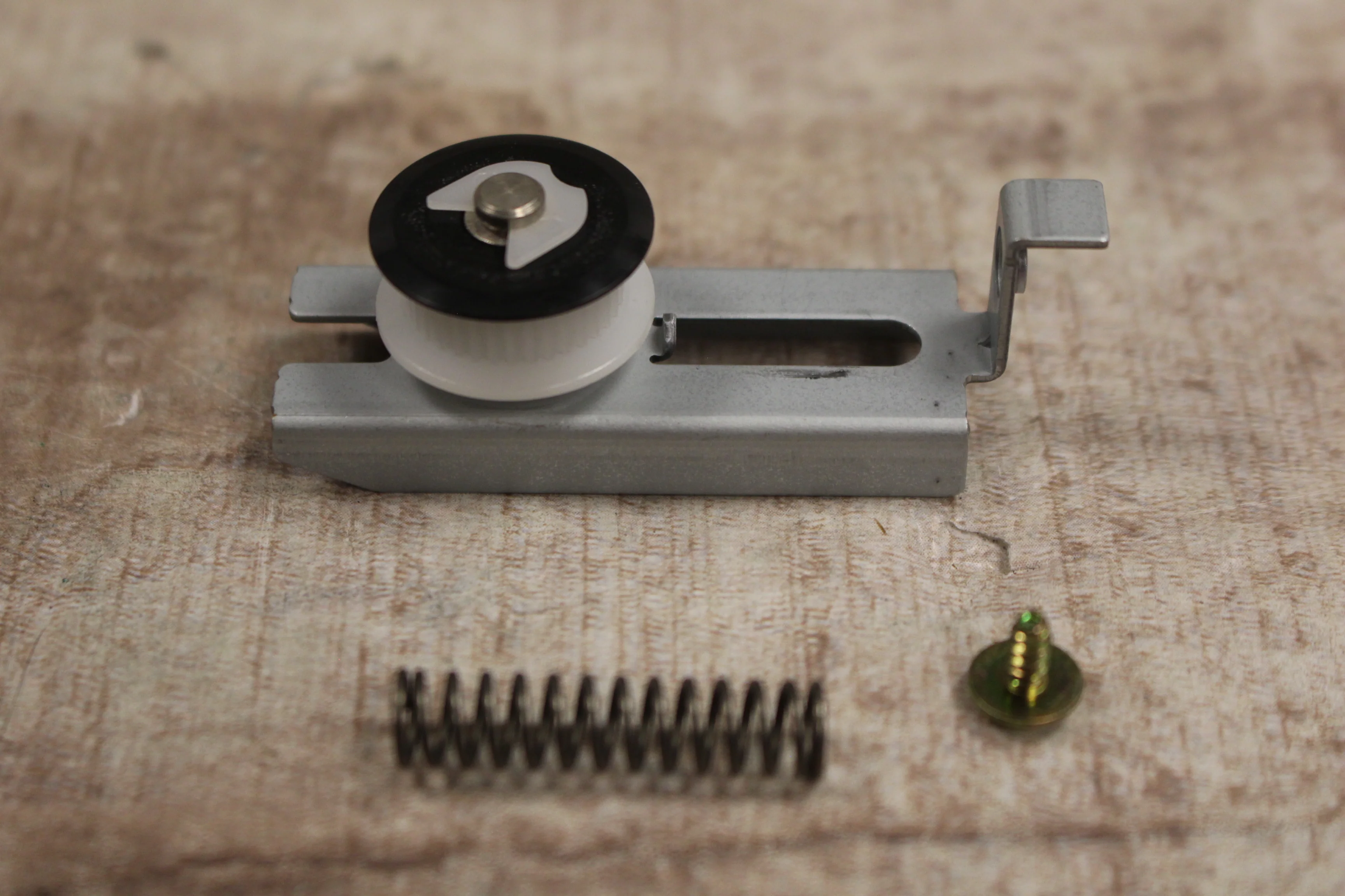 Brother DCP 8040 Replacement Part LE8634001 Pulley Assembly and Spring -Used
