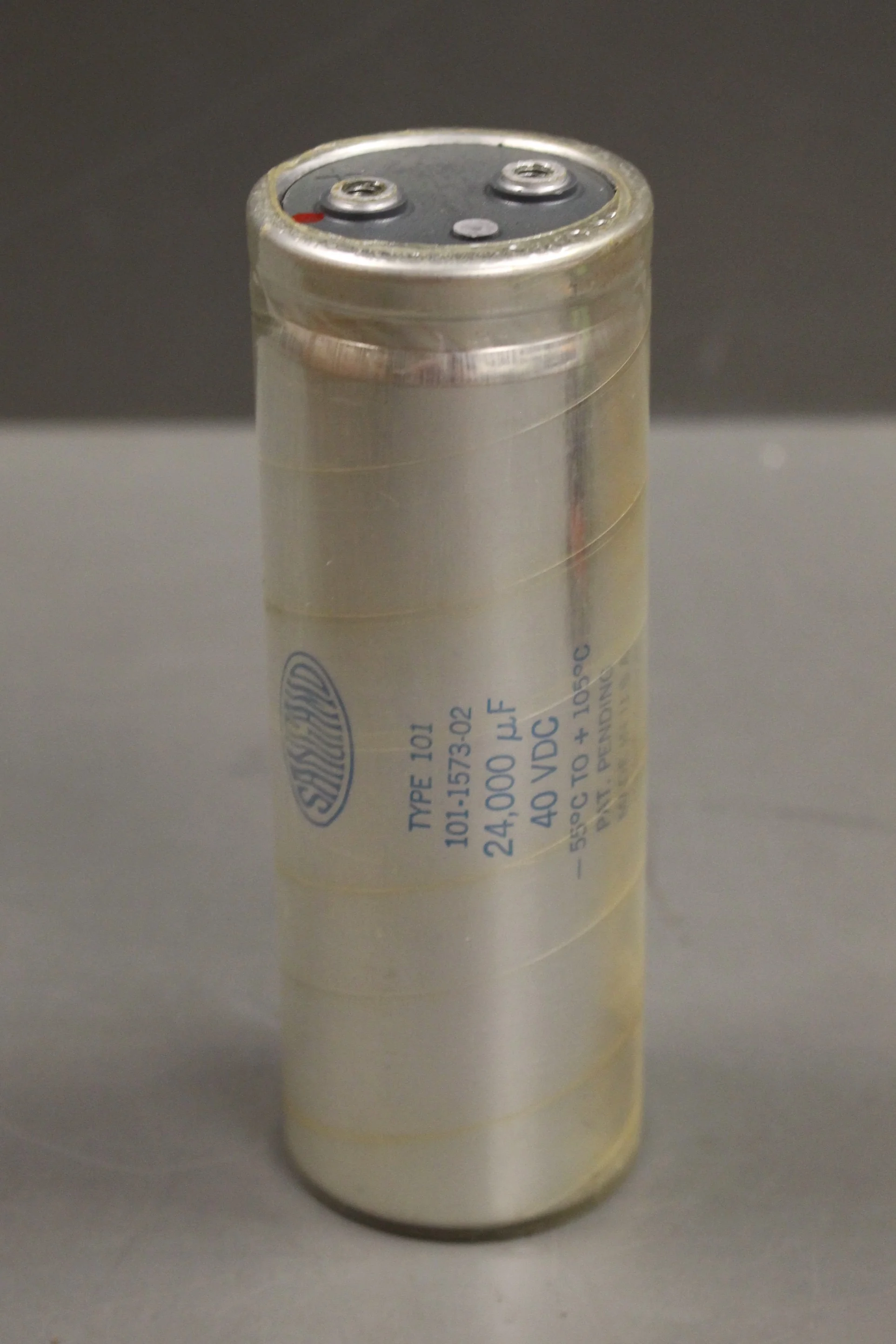 Electrolytic Fixed Capacitor, 101243U040BF2A, 77C717442P011, Silver, New