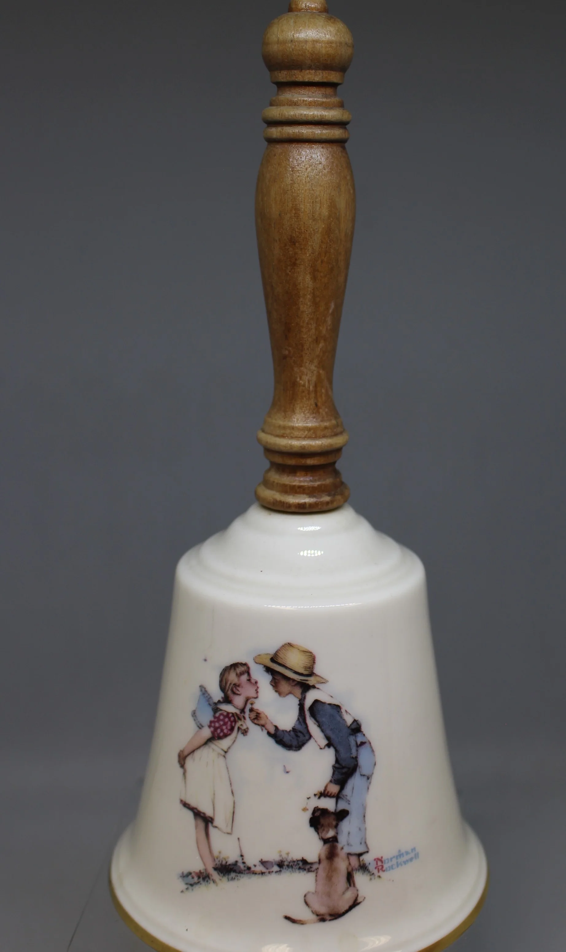 Norman Rockwell 9" "Beguiling Buttercup" Wooden Handle Bell - Gorham - 9" - Used