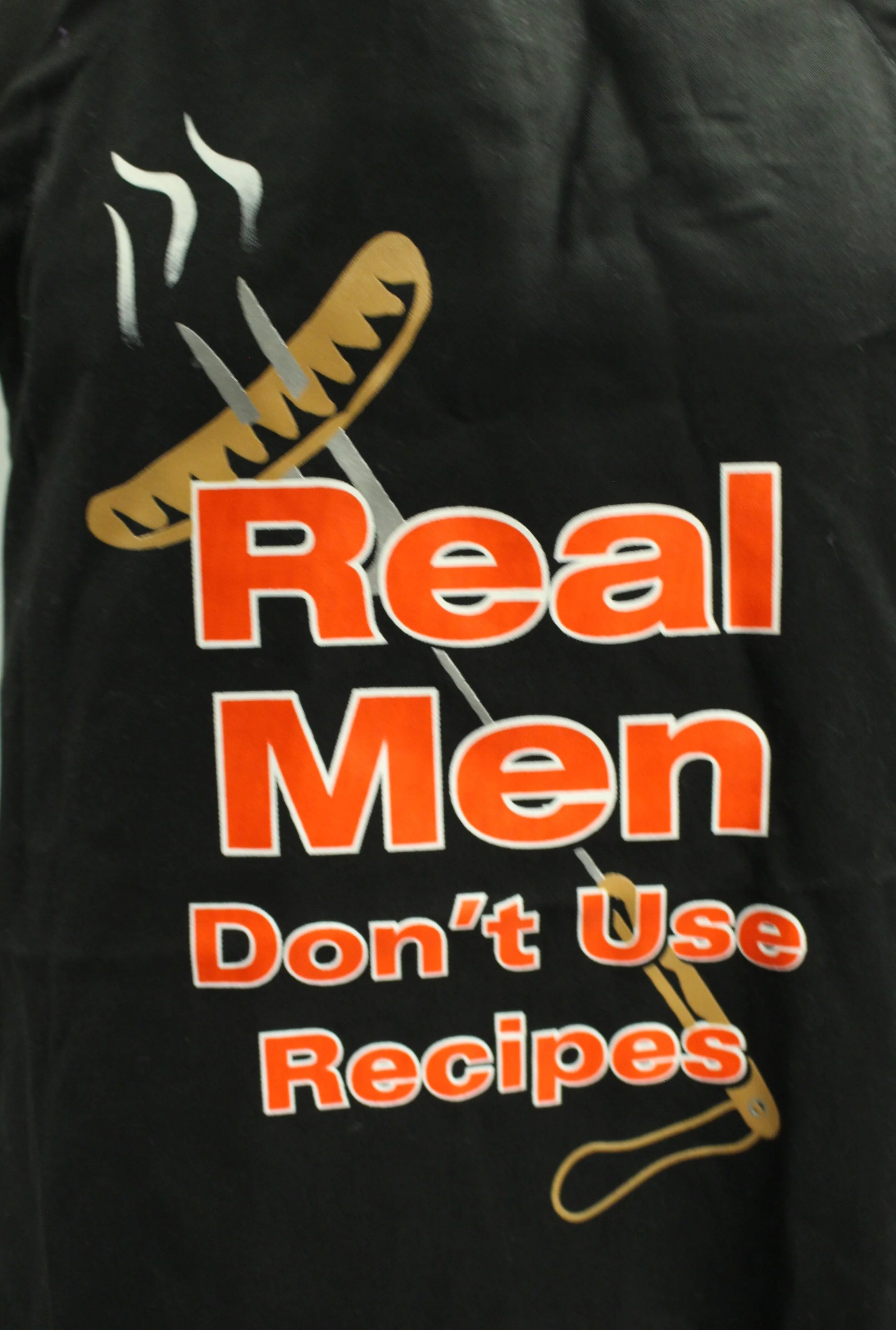 "Real Men Don't Use Recipes" Apron - Black - Used - Image 2